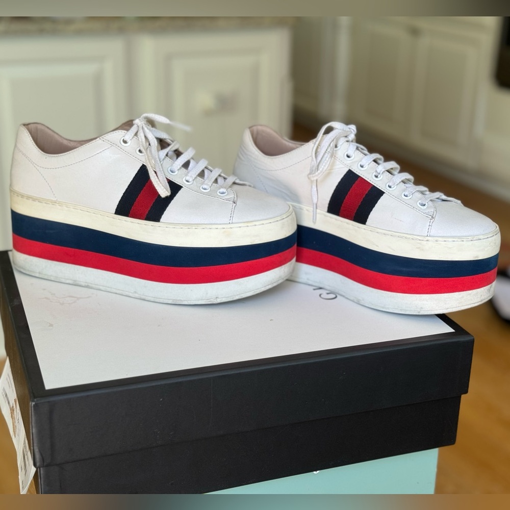 Platform Gucci sneakers.